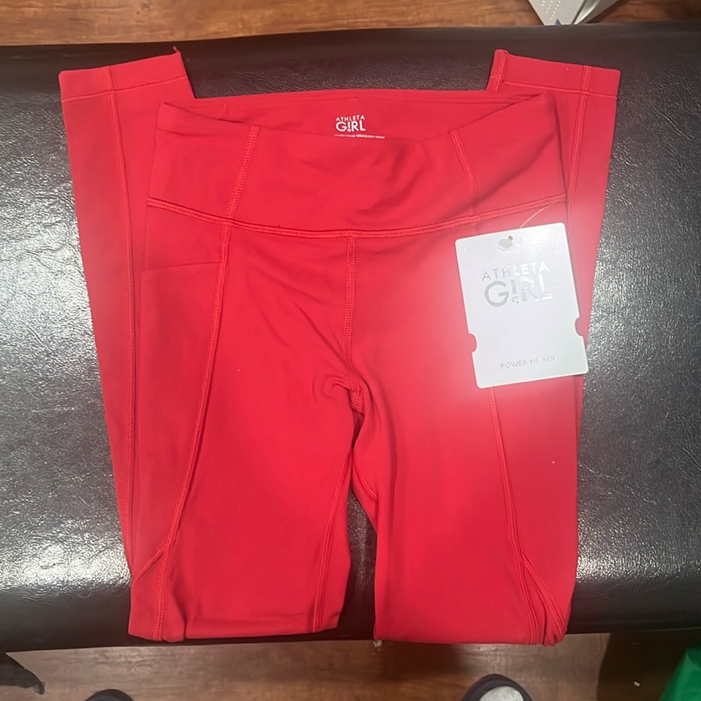Girls size 7 NWT Lulu lemon leggings. Color is red.